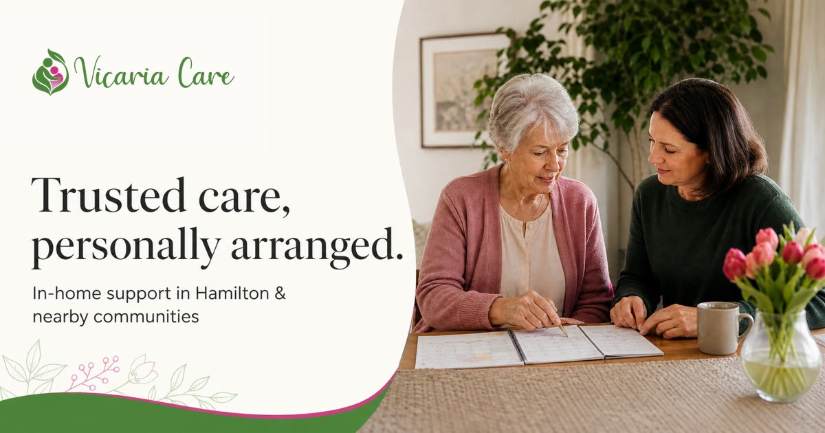 An older adult and an adult daughter reviewing a weekly home-support calendar with a care coordinator at a dining table